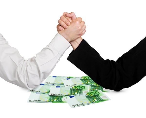 http://www.dreamstime.com/stock-images-two-wrestling-hands-money-euro-isolated-white-background-image30497574