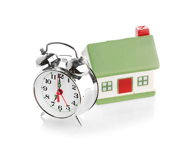 http://www.dreamstime.com/royalty-free-stock-images-toy-house-alarm-clock-isolated-white-image35493649