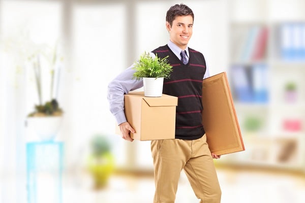 http://www.dreamstime.com/royalty-free-stock-photos-smiling-young-man-boxes-moving-apartment-image29907768