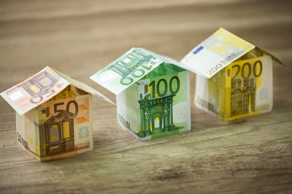 http://www.dreamstime.com/royalty-free-stock-photos-houses-made-euros-currency-banknotes-wooden-background-image66053038